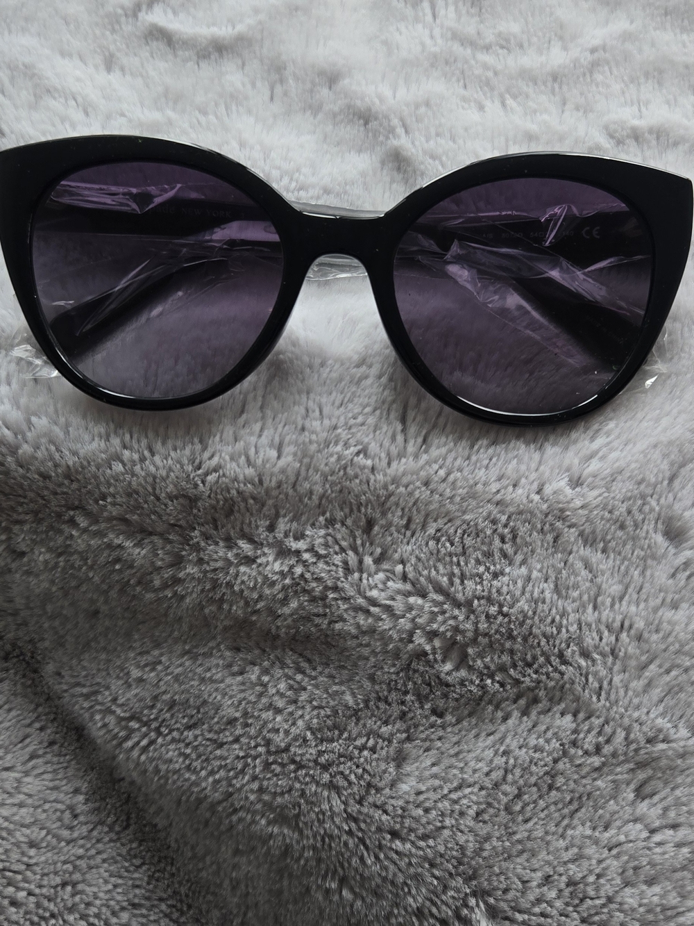kate spade Black Frame Sunglasses with Purple Lenses